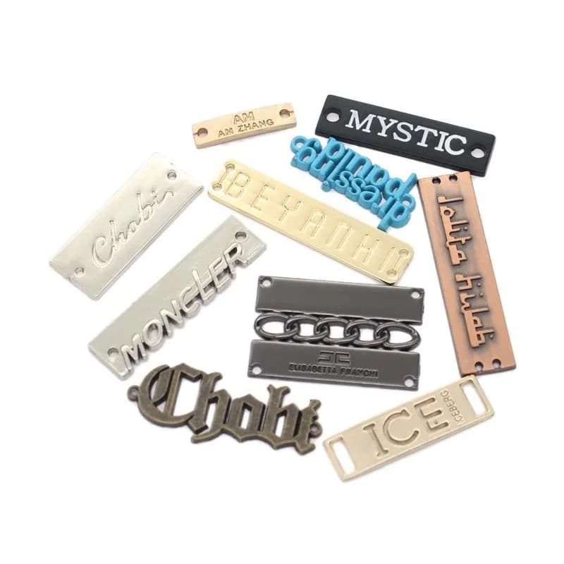 Custom 3D Embossed Zinc Alloy Logo Labels — MANCHAO storefront reference 1