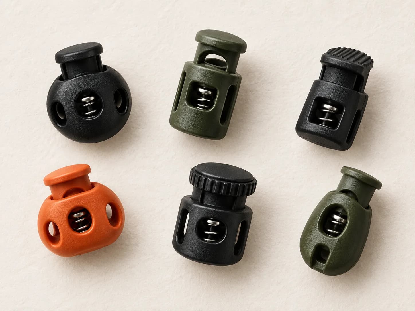 Illustrative collection image of plastic cord stoppers and rope toggles